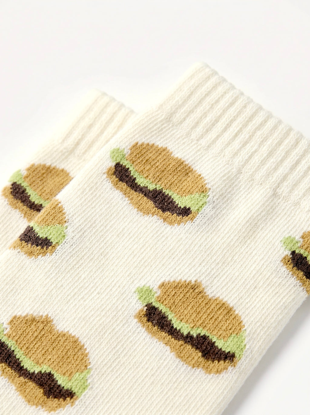 HB Snowear Hamburger Merino Wool Snow Socks — on-body shot showing hamburger pattern detail