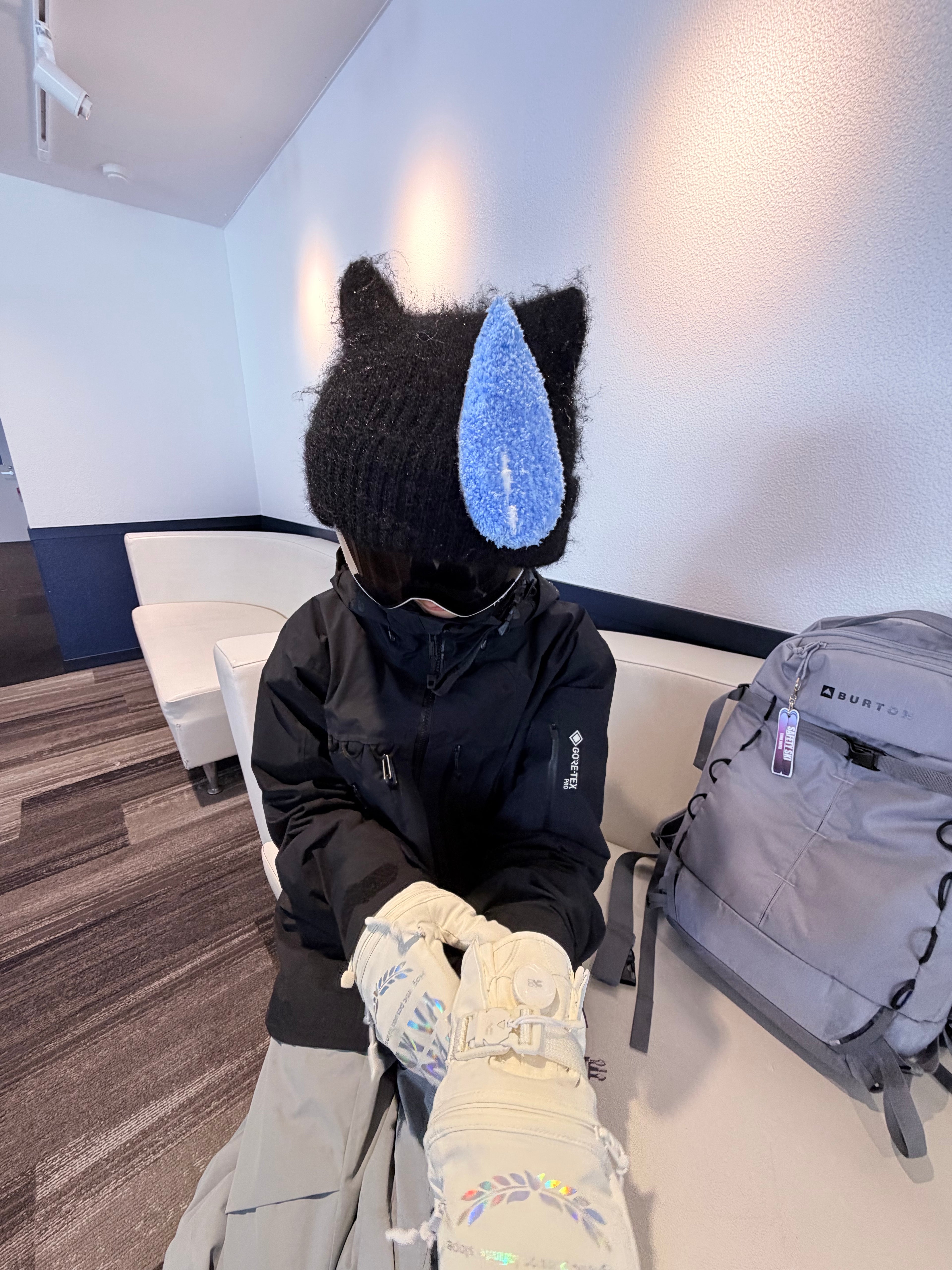 HB Snowear Cat-Ear Mohair Ski Beanie Black — indoor lifestyle shot showing cat ear design