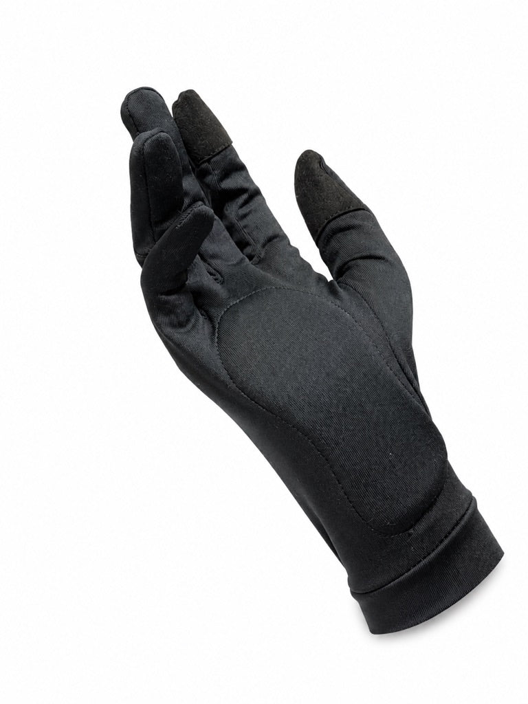 HB Snowear Ski Liner Gloves — lifestyle shot showing glove flexibility and slim fit